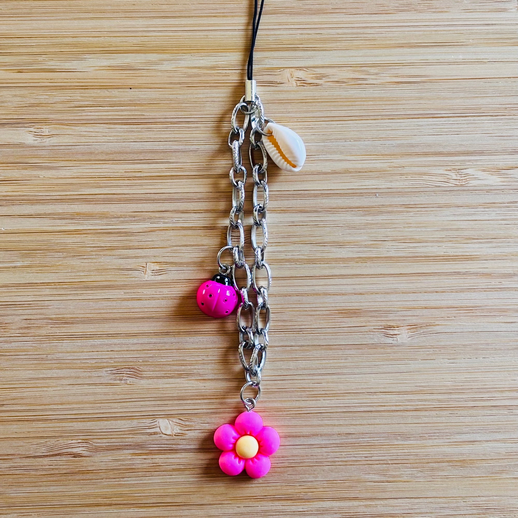 Bijou de téléphone Pink Power