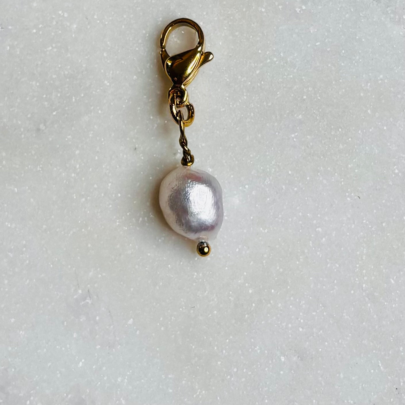 Charm "La perle de Rivière"
